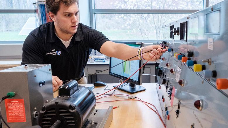 Engineering student Michael Aboulhouda works on a project during class. 